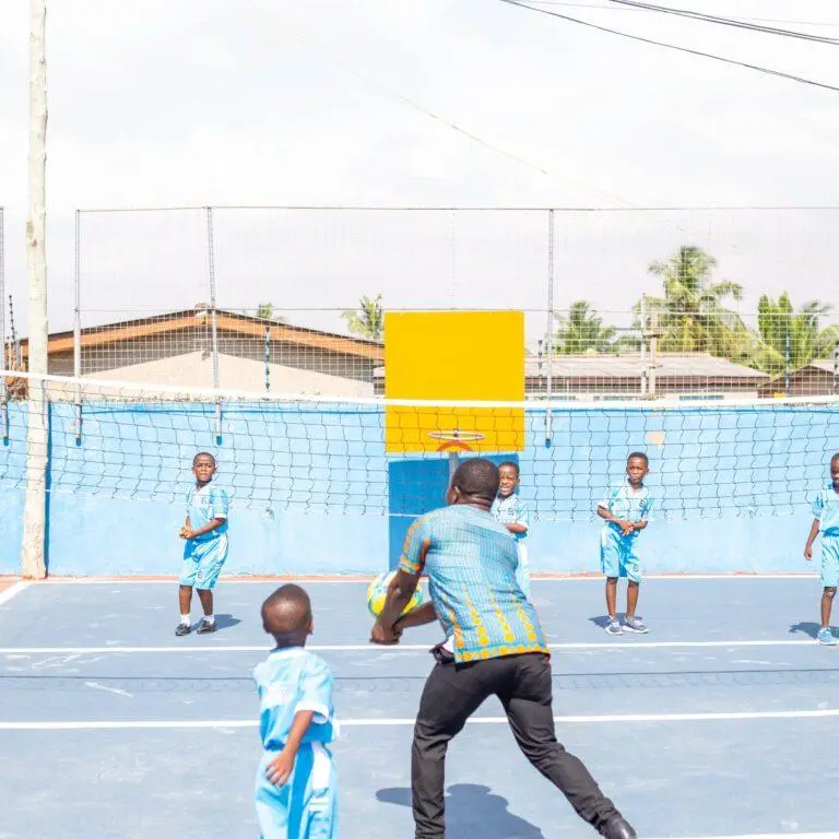 A pupil taking a shot during a football match